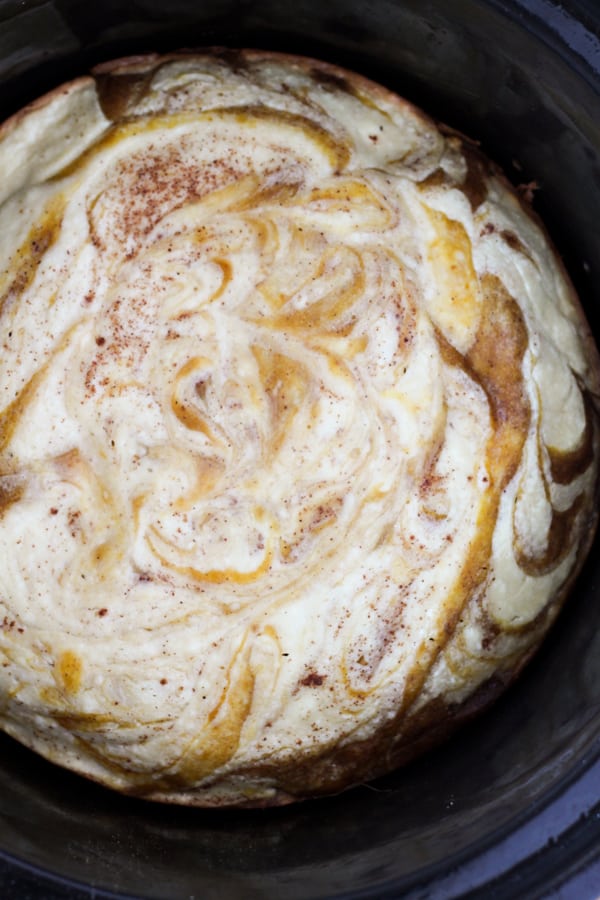 Slow Cooker Cream Cheese Swirl Pumpkin Bread - homemade pumpkin bread with a decadent cream cheese swirl baked right in the slow cooker! 