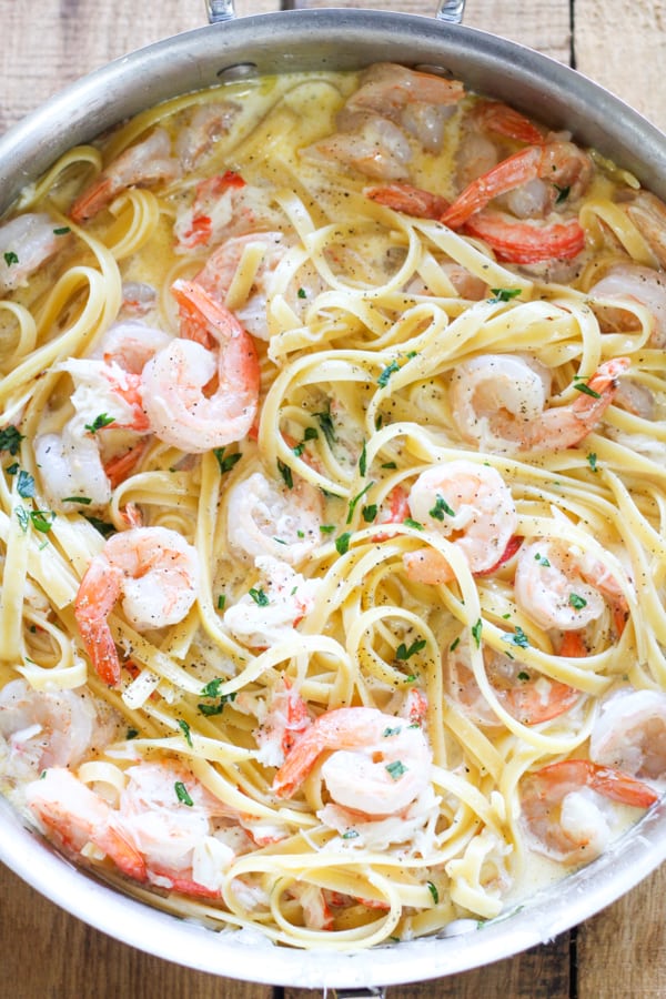 Succulent sautéed shrimp and sweet lump crab meat in a delicious homemade alfredo sauce. This homemade one-pot seafood alfredo is better than Olive Garden! 