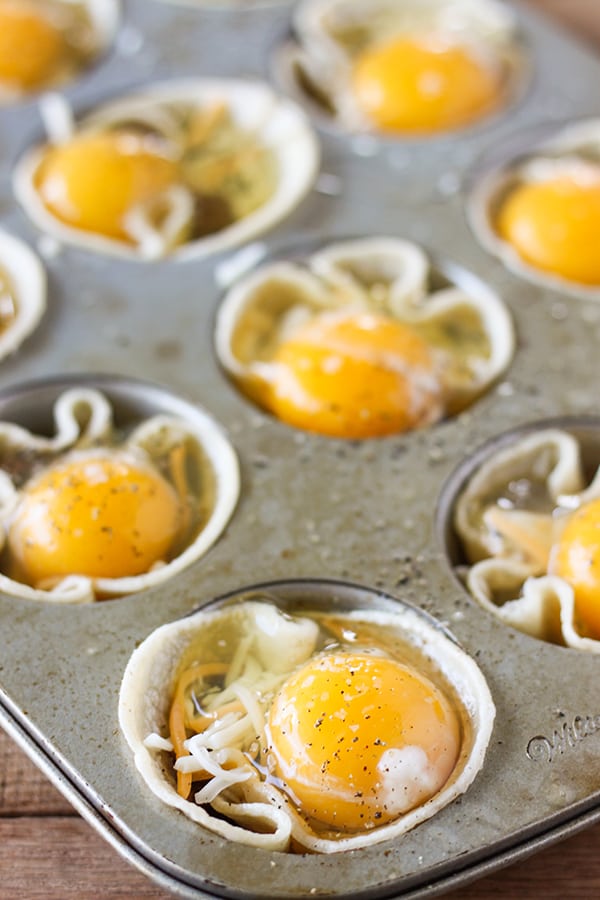 Breakfast Taco Cups - seasoned turkey sausage, shredded cheese and an egg baked in a tiny taco cup! 