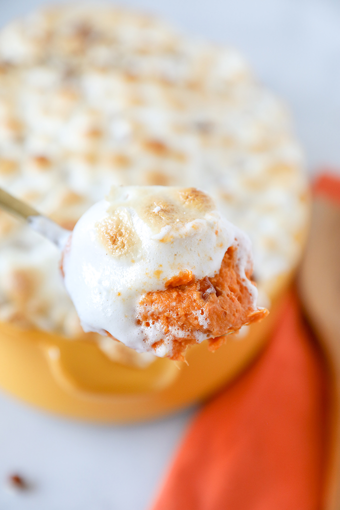 Sweet Potato Casserole -Fresh sweet potatoes mashed with butter and heavy cream, mixed with toasted pecans and topped with toasted marshmallows. 