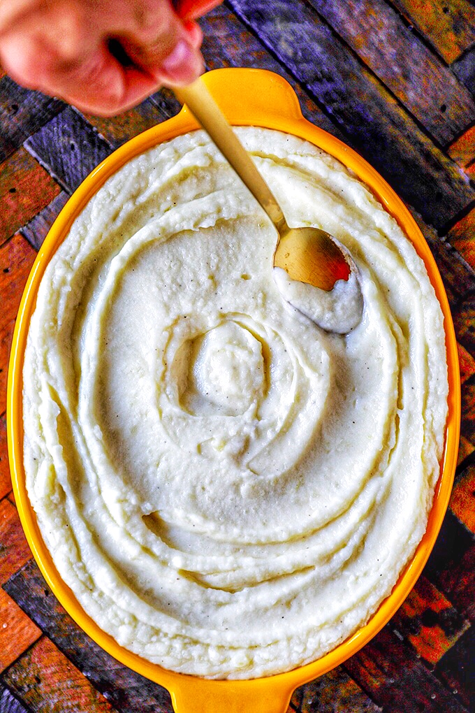 These epic Garlic Mashed Potatoes are buttery and delicious and the perfect wow factor for the holiday table or special dinner. 