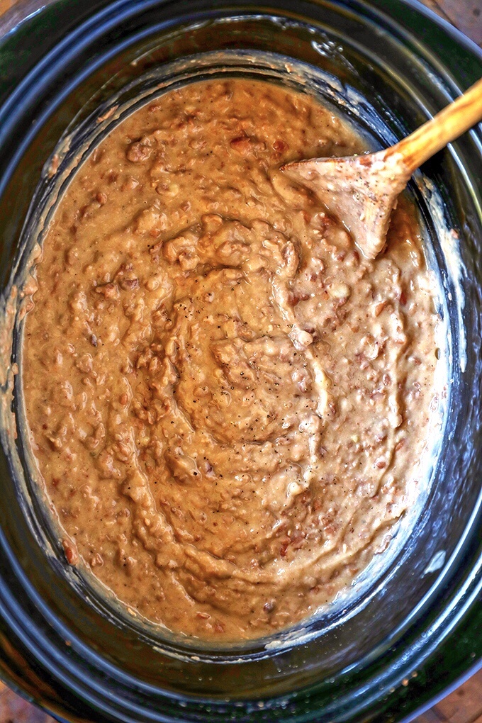 This is the easiest and best Refried Beans Recipe!  Cook and mash them right in your slow cooker, you won't go back to canned refried beans! 