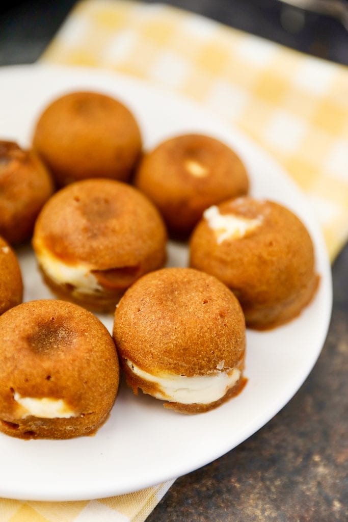 Instant Pot Pumpkin Bites -  homemade pumpkin muffin bites with a sprinkle of cinnamon and a swirl of cream cheese.