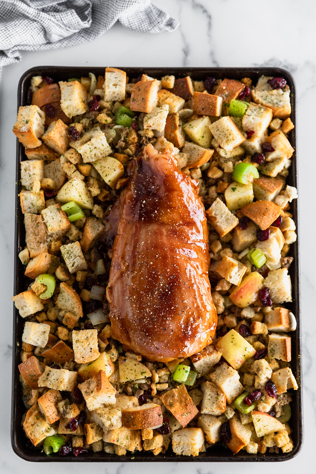 https://www.number-2-pencil.com/wp-content/uploads/2022/12/Sheet-Pan-Garlic-Butter-Turkey-Breast-and-Stuffing-2-2.jpg